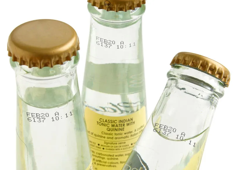 Continuous Inkjet Code printed onto soft drinks glass bottle label