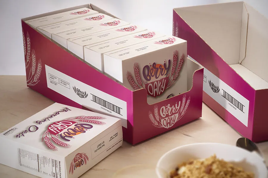Druckmuster des Domino Cx150i auf Trays für Müsliverpackungen im Lebensmittelbereich