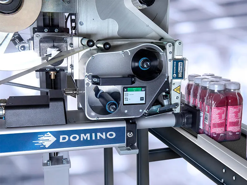 Mx350i-T4 Labelling a package of shrink wrapped Juice